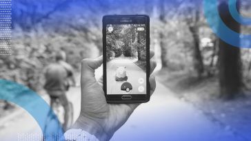 Augmented reality (AR) image of a person playing Pokemon Go, an AR game, on a bike path. 
