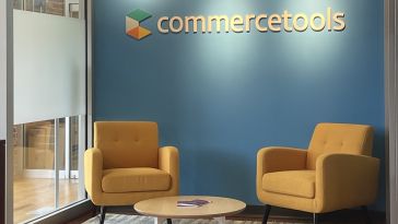 photo of commercetools office lobby with chairs and logo