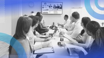 People attending a hybrid meeting. Advance planning can help make hybrid meetings more productive.