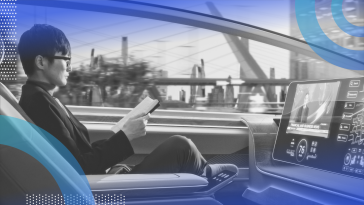 self-driving car image of a person in a theoretical rendering of a self-driving car reading a book