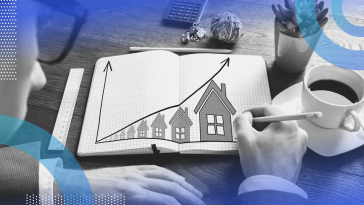 Maximum Likelihood Estimation (MLE) image of a person holding a pencil to a notebook. On the page is a line graph with an upward trajectory to the right. Under the line are houses increasing in size as the line graph goes up. There is a cup of coffee next to the notebook.