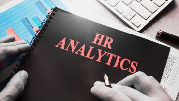 HR analytics written on the cover of a notebook