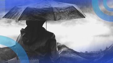 A person in a storm. CEOs and CHROs can navigate uncertainty with a little bit of planning.