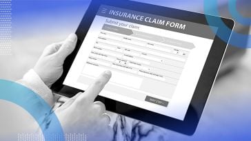person filling out insurance claim form on ipad
