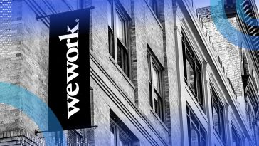 A WeWork sign on a building.