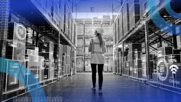A woman walking through a warehouse with technological holograms over the product.