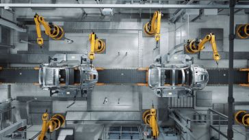 Image of a car production line in a factory.