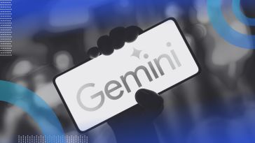 hand holding a phone that says gemini