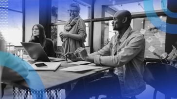 Diversity, equity and inclusion executives sitting at a conference table.