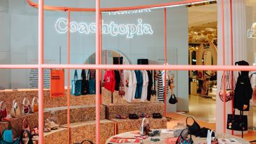 Coachtopia's pop-up store at Selfridges in London using furniture made from Upcrushed Upcrafted leather and recycled neon LED lights.