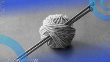 Ball of yarn with knitting needles representing python string