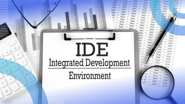 A piece of paper that says “IDE Integrated Development Environment” surrounded by a pen, calculator, magnifying glass and bar graphs on paper.