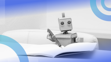 A small robot is sitting at a desk and writing with a pen.