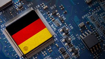 A circuit board with a German flag as the microchip. 