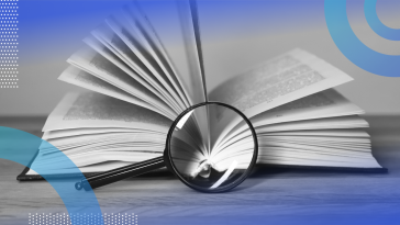 magnifying glass searching text in an open book