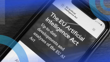 A device screen displays type that says The EU Artificial Intelligence Act.