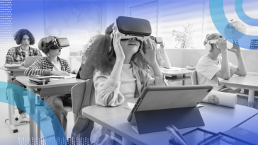 School kids are wearing VR headsets in a classroom.