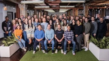 The HealthJoy team poses for a group photo in the company office.