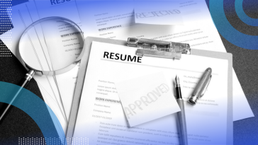 A resume on a clipboare with an uncapped pen on top of it and a sticky note reading “approved” on top of another resume with a note that reads “rejected” next to a magnifying glass.