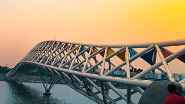 The Atal Bridge in Ahmedabad is pictured against an orange sky