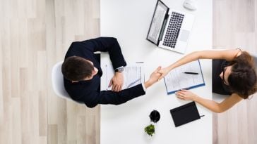 recruiter shaking hands with candidate