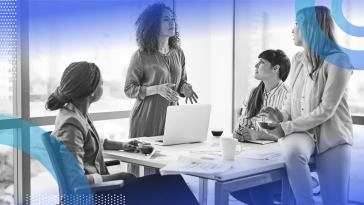 Team of employees discussing strategy in office