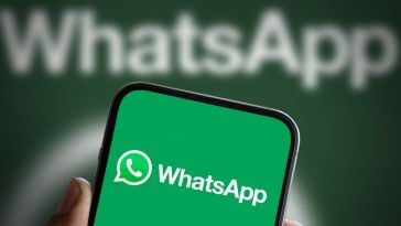 Phone with WhatsApp mobile application open.