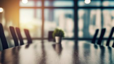 An empty conference room is pictured.