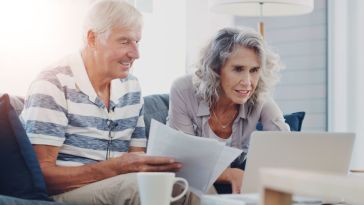 Couple plans retirement investments. 