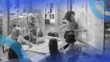 Product manager leading a team meeting