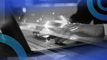 A laptop with data migrating and a closeup of someone typing on it