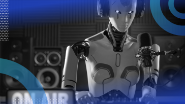 A robot sits at a microphone behind a sign that says On Air