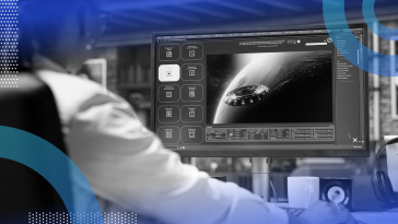 A woman works with a generative AI model on a desktop computer