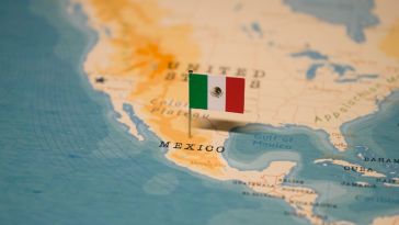 Mexico's flag overlaid on map of the country