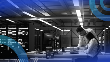 Cybersecurity analysts working in a data warehouse