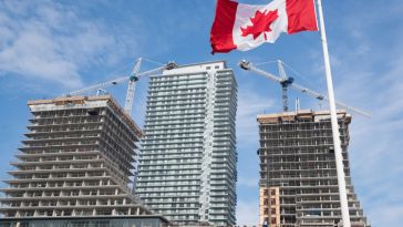 High rise buildings and Canadian flag