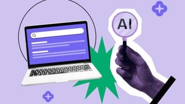 Picture of laptop with hand holding an 'AI' sign, with a light purple background.
