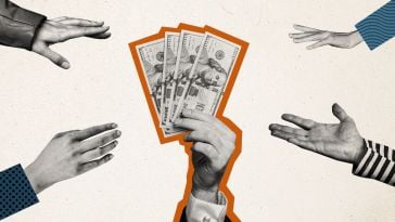 Hands reach for a stack of $100 bills.