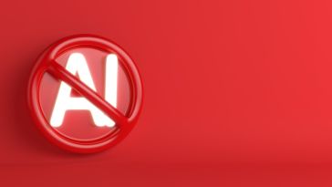 An anti-AI sign is pictured against a red background.