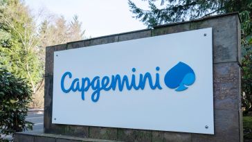 An outdoor sign featuring the blue Capgemini logo.