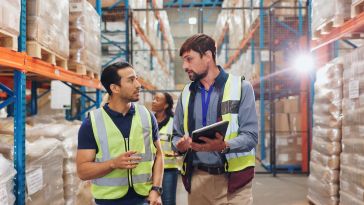 Warehouse employees are shown