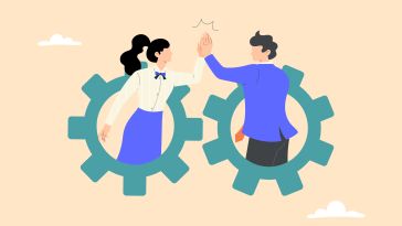 An illustration of a businessman and businesswoman rising out of two mechanical wheels to high-five each other, symbolizing the idea of teamwork
