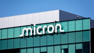 The white Micron logo pictured on the side of a building.