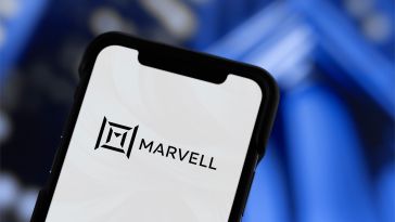A smartphone displaying the Marvell logo with a geometric design against a blurred blue background, conveying a professional, modern tone.