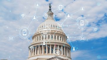 A state capitol building is overlayed with images of smartphones and other technological symbols.