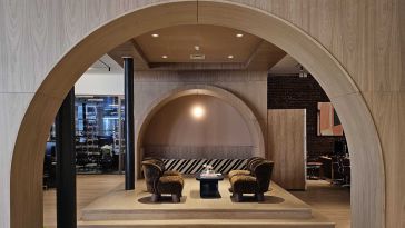 A photo of the GlossGenius office through an archway.