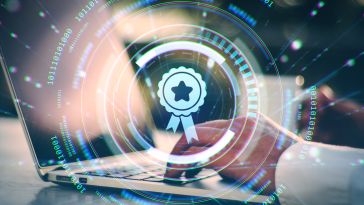 A close-up of a person's hands typing on a laptop, overlaid with a digital graphic of a glowing blue ribbon award icon surrounded by circular patterns and binary code strings.