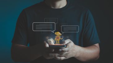 Small robot in someone's hands
