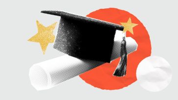 A graduation cap sits on top of a college diploma.