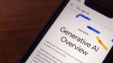Photo of Google's AI Overview site pulled up on a smartphone